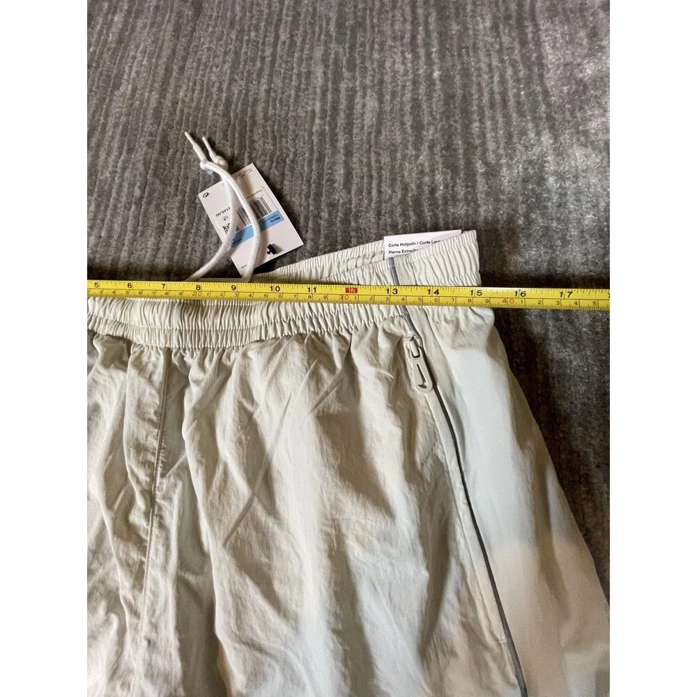 Nike Track Pants Mens Medium White Solo Swoosh Loose Fit Taper Leg Stacked New